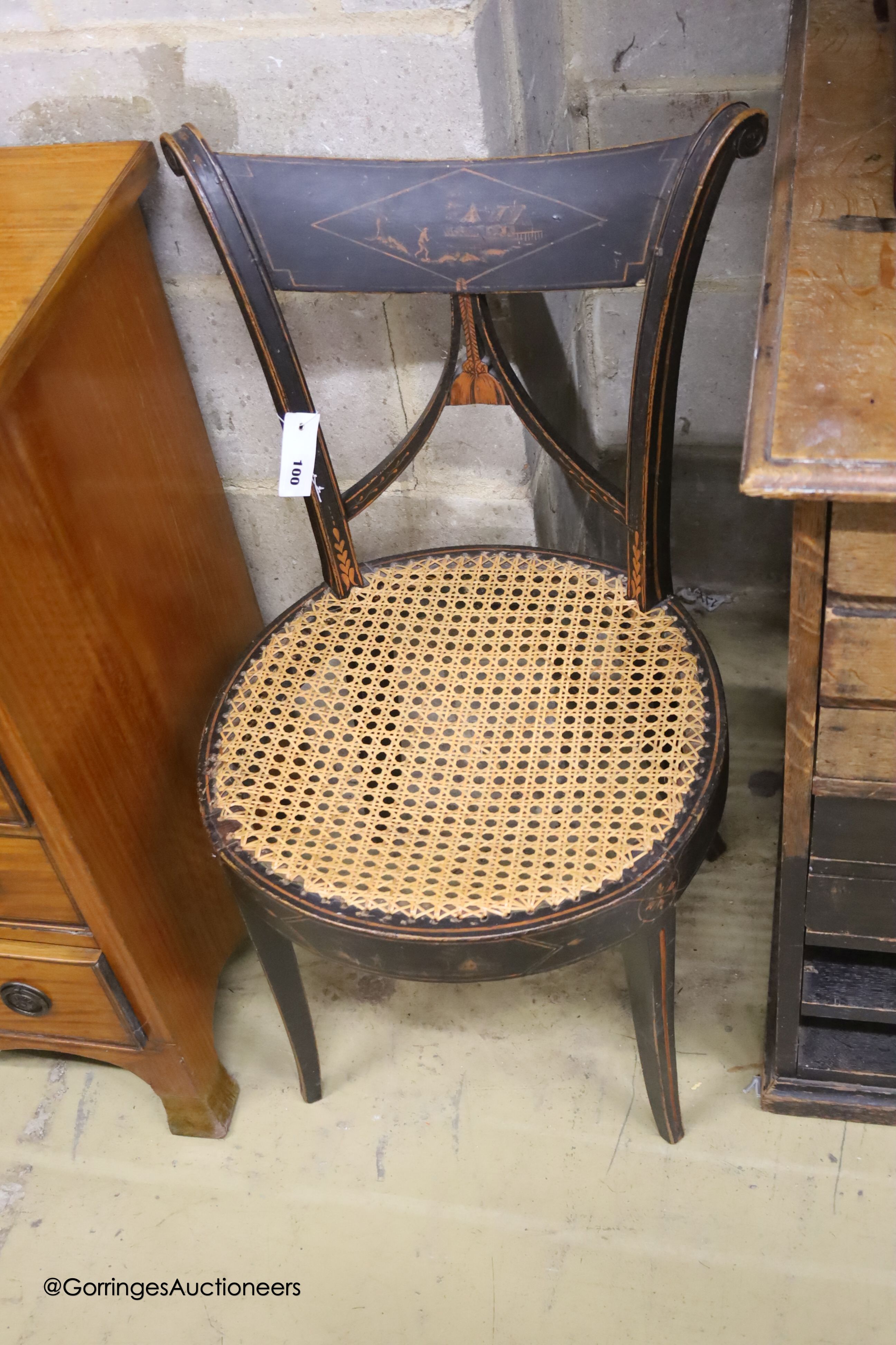 A pair of early 19th century Italian painted cane seated side chairs